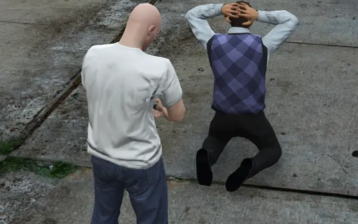 Tying the hands of a kneeling hostage, with the progress bar